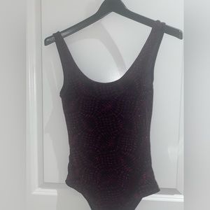 Black sparkly and pink shimmers, button bodysuit
